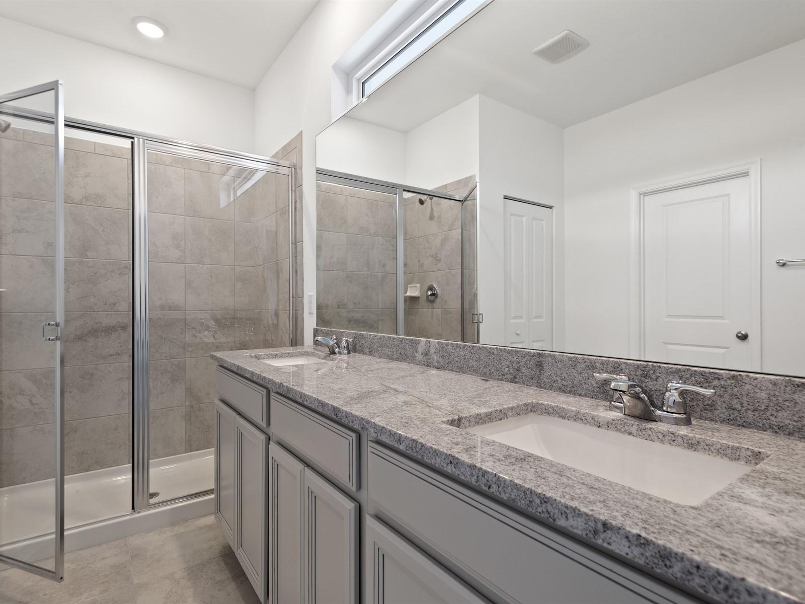 1927 Harding Street Lake Worth, FL 33460 - Photo 13 of 19 a bathroom with a granite countertop sink and a mirror