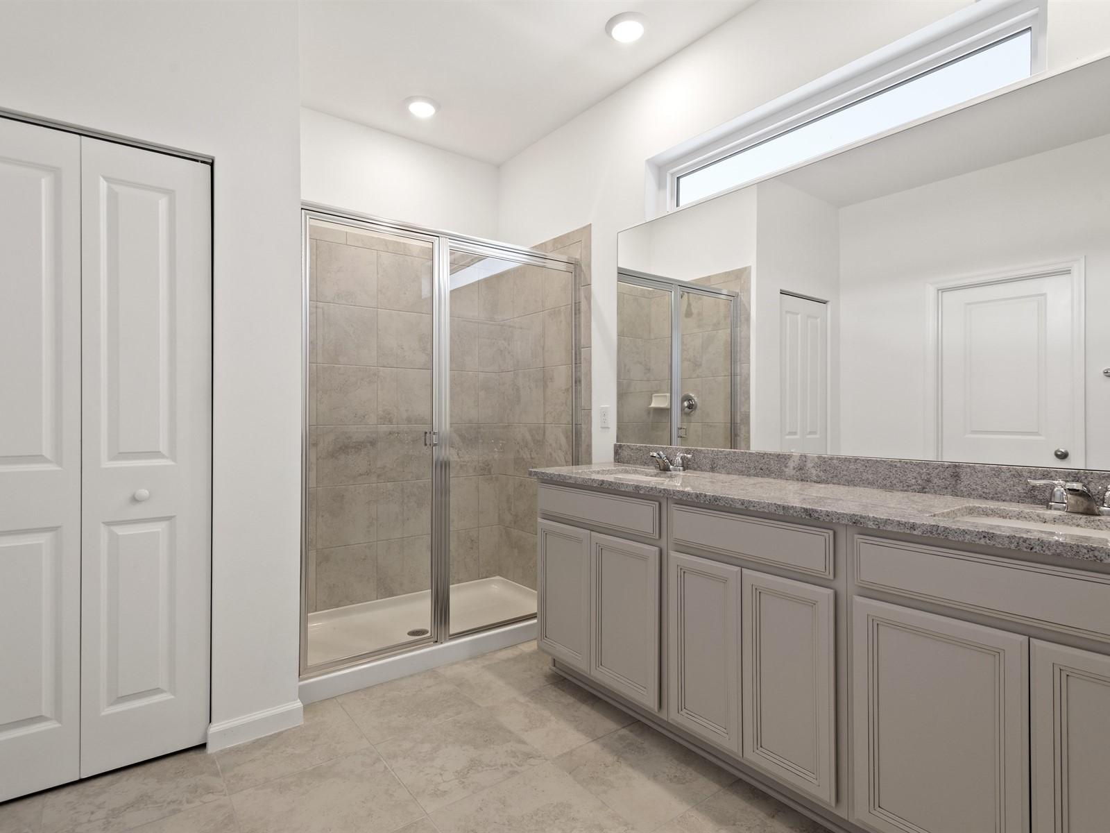 1927 Harding Street Lake Worth, FL 33460 - Photo 14 of 19 a bathroom with double sink and a mirror