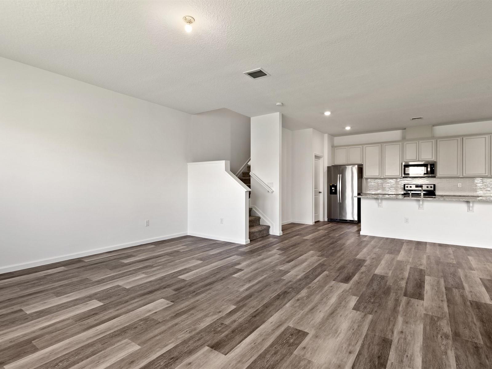 1927 Harding Street Lake Worth, FL 33460 - Photo 6 of 19 a view of kitchen with wooden floor