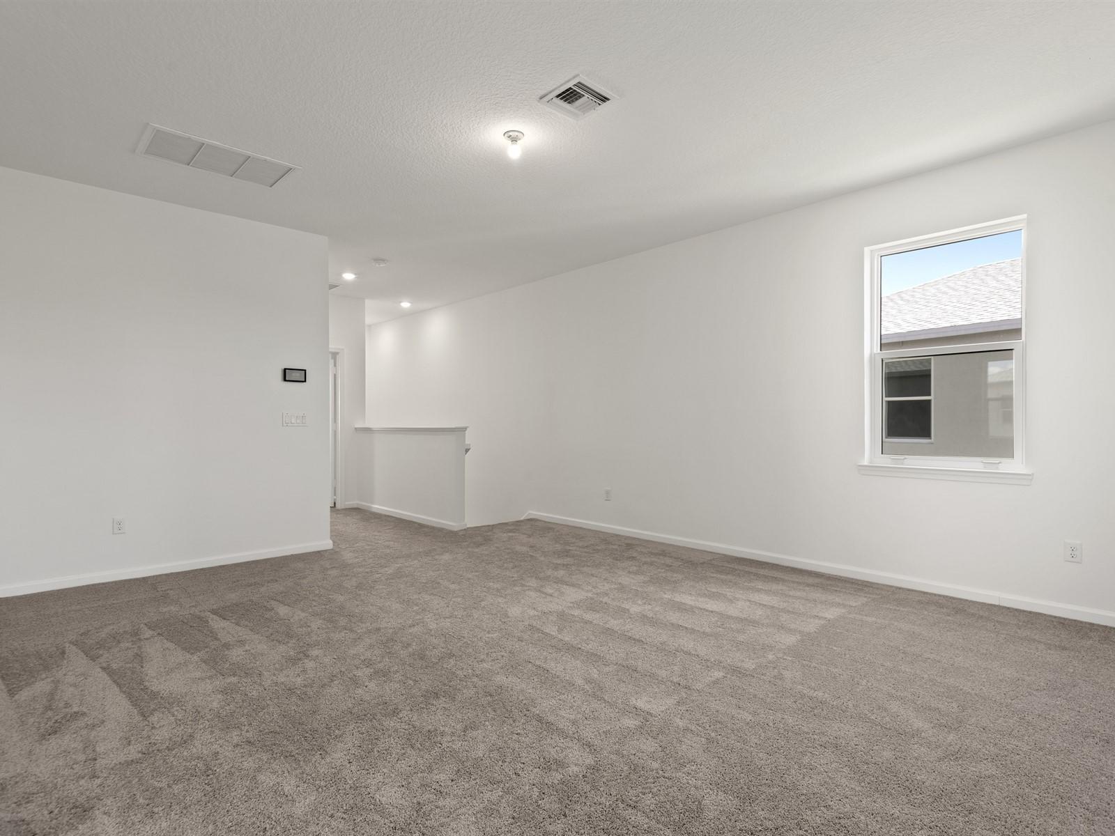 1927 Harding Street Lake Worth, FL 33460 - Photo 10 of 19 a view of an empty room with a window