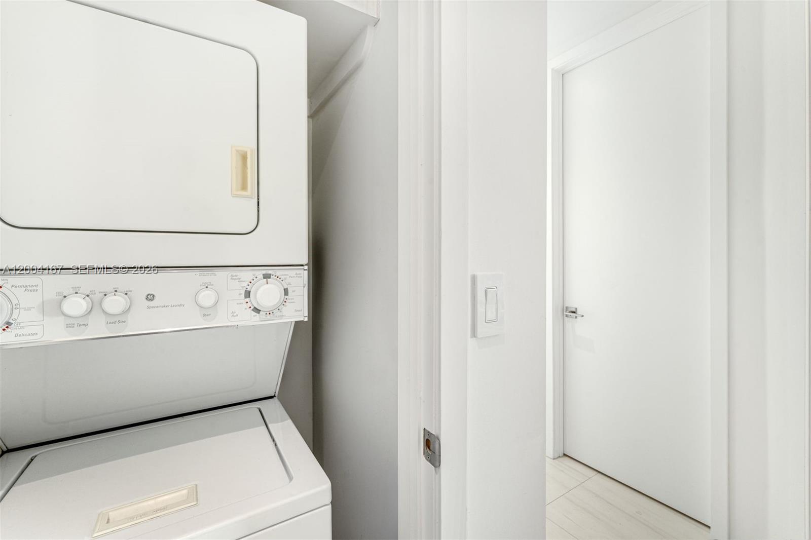 1723 Southwest 2nd Avenue, Unit PH2 Miami, FL 33129 - Photo 14 of 18 a view of washer and dryer