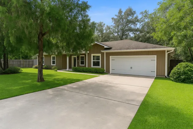 a view of outdoor space yard and garage