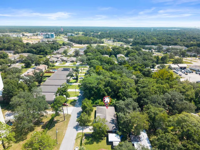an aerial view of a city with lots of residential buildings