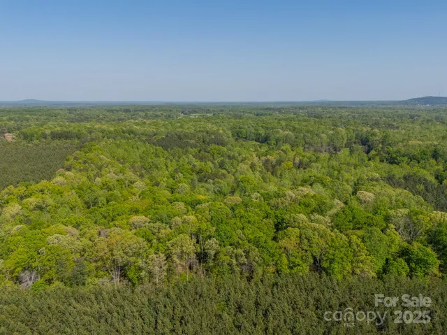 a view of a field with an outdoor space