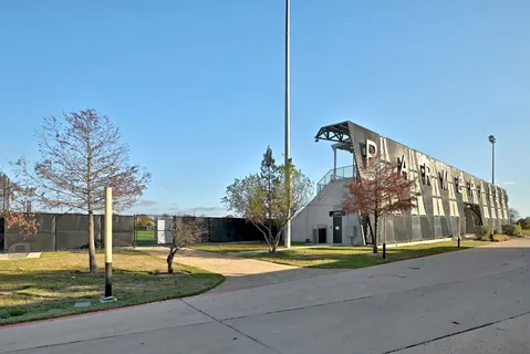 a house view with a swimming pool