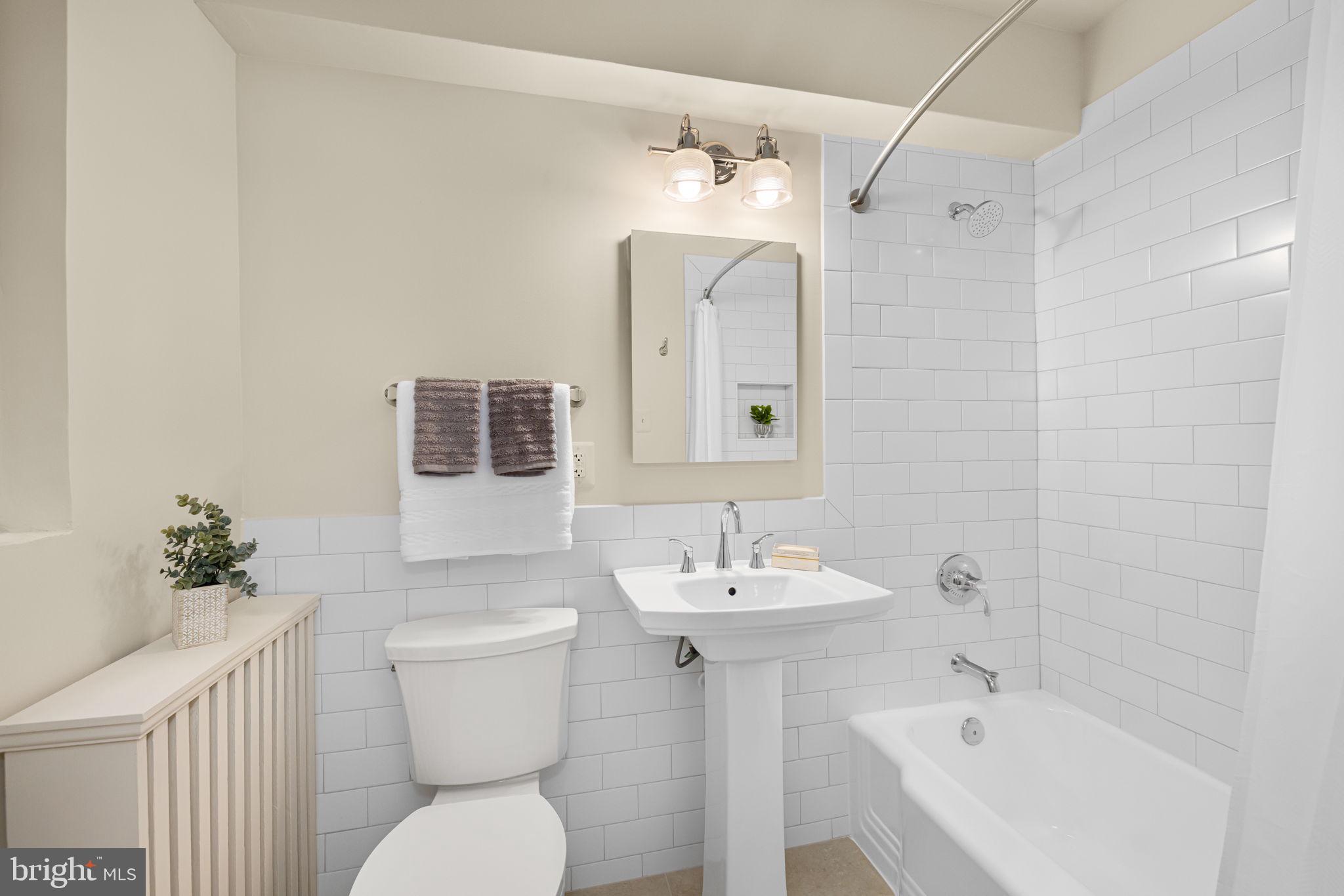 2500 Q Street Northwest, Unit 410 Washington, DC 20007 - Photo 10 of 31 Renovated Full Bathroom