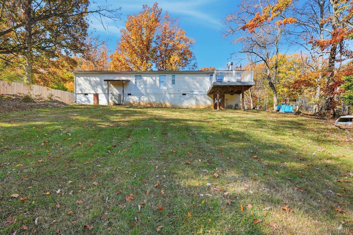 174 Shelter Lane Amherst, VA 24521 - Photo 16 of 29 a view of a big yard with a house