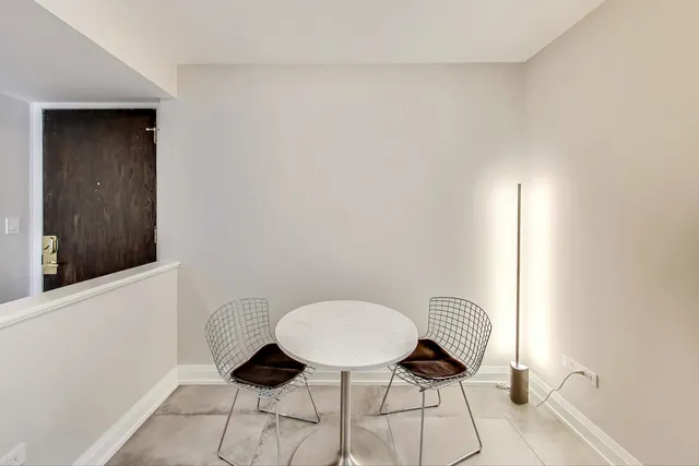 a potted plant sitting on top of a wooden table
