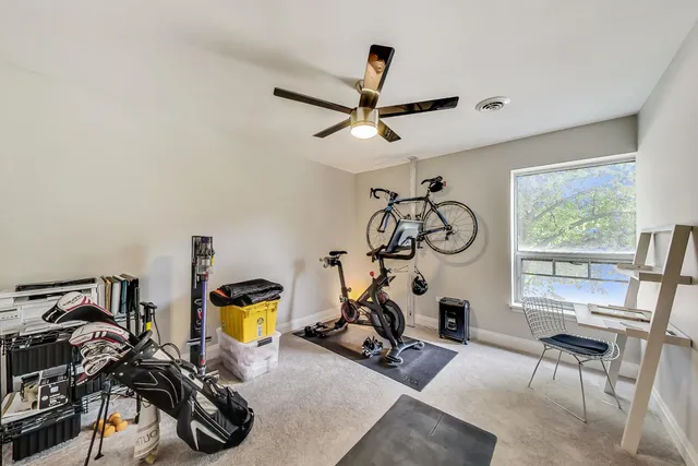 a view of a room with gym equipment