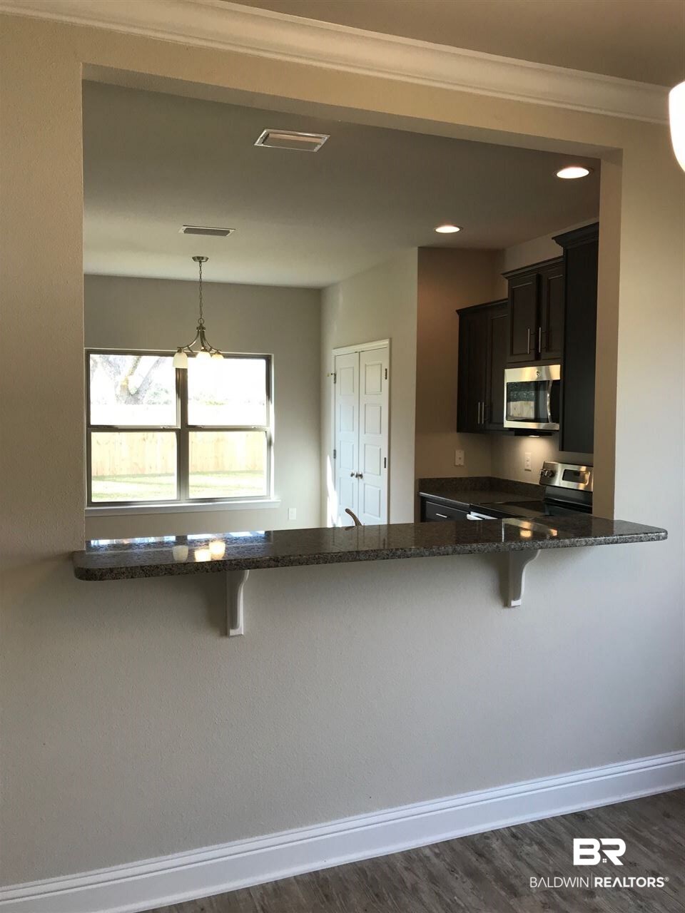 15490 Troon Drive Foley, AL 36535 - Photo 7 of 28 Pass through to kitchen