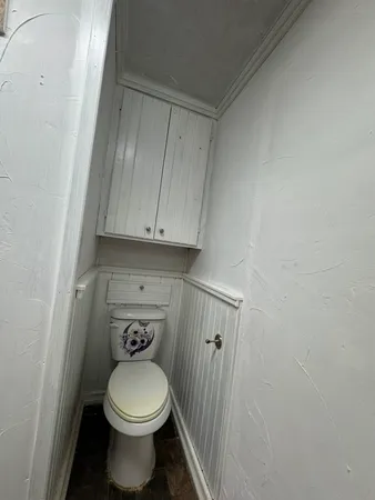 a bathroom with a toilet