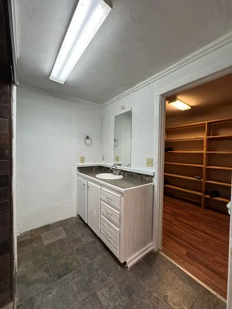 a kitchen with a stove and a sink