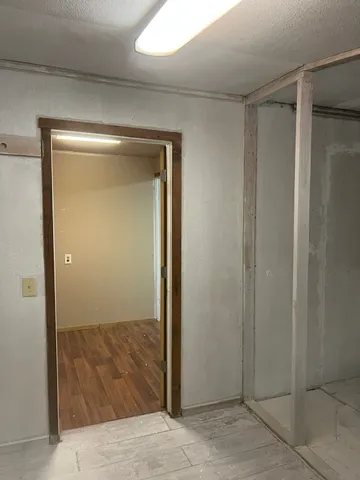 an empty room with windows