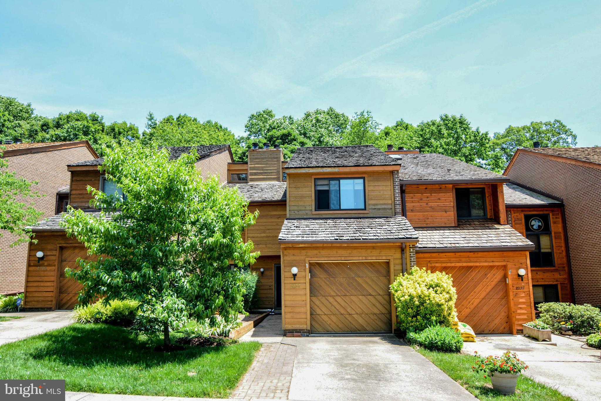 2237 Cedar Cove Court Reston, VA 20191 - Photo 2 of 27 a front view of a house with garden