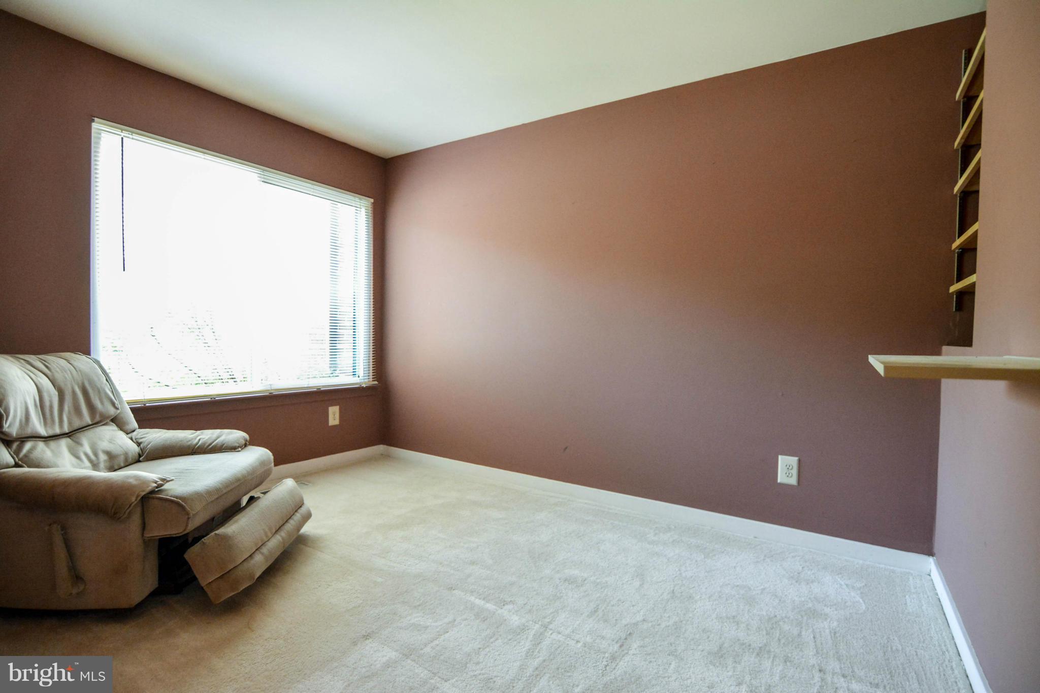 2237 Cedar Cove Court Reston, VA 20191 - Photo 11 of 27 a living room with furniture and a window