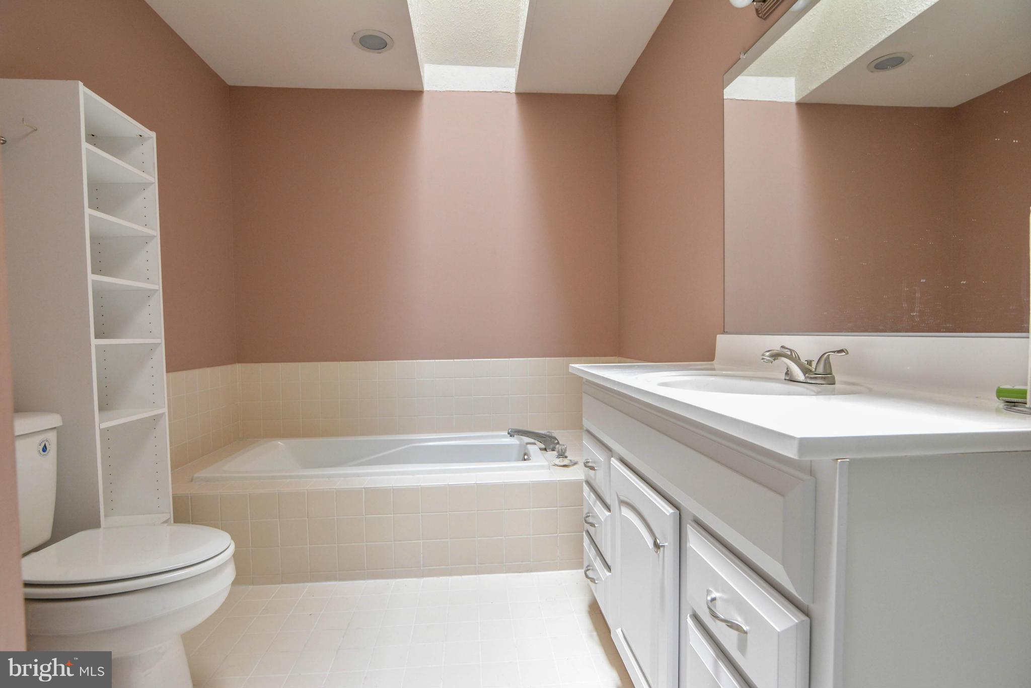 2237 Cedar Cove Court Reston, VA 20191 - Photo 18 of 27 a bathroom with a sink and a toilet