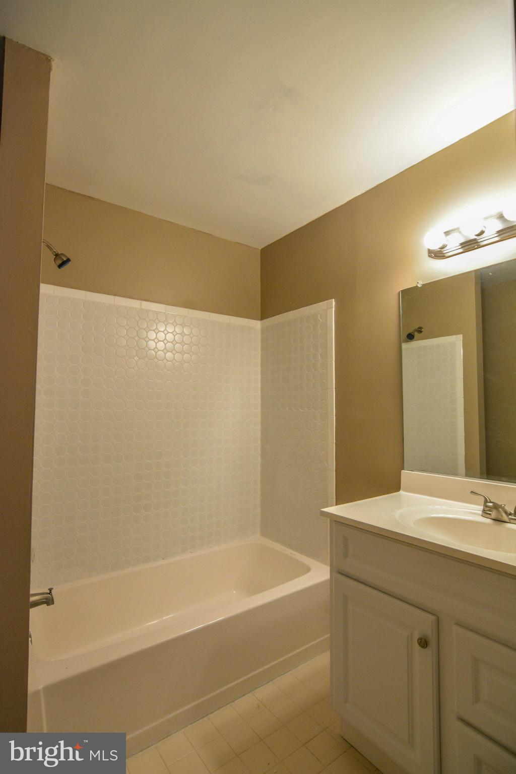 2237 Cedar Cove Court Reston, VA 20191 - Photo 21 of 27 a bathroom with a bathtub and a sink