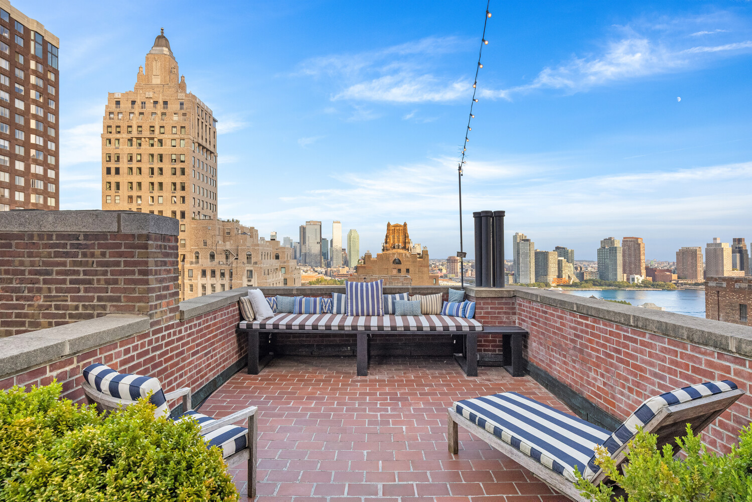 400 East 52nd Street, Unit PHTOWER Manhattan, NY 10022 - Photo 15 of 23 a view of a balcony with city view