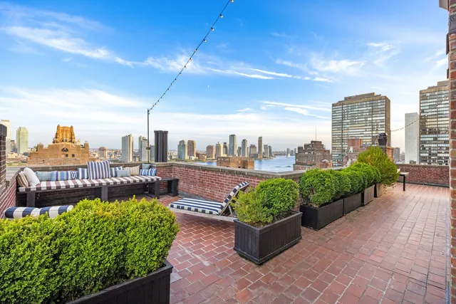 a view of a chairs and table in the terrace