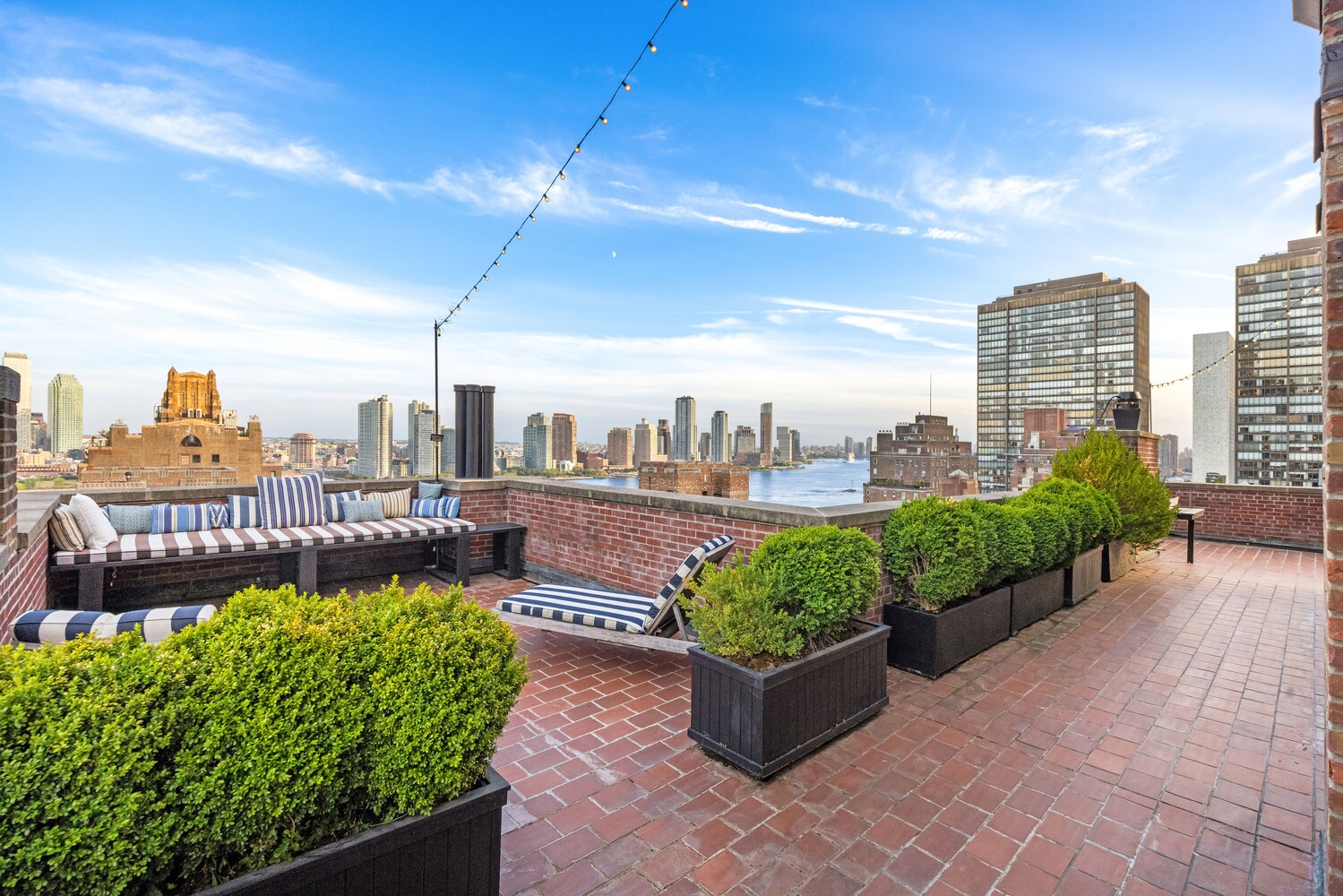 400 East 52nd Street, Unit PHTOWER Manhattan, NY 10022 - Photo 18 of 23 a city view with tall buildings