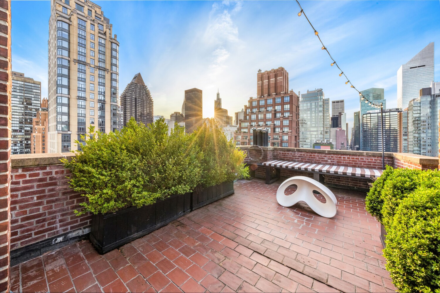 400 East 52nd Street, Unit PHTOWER Manhattan, NY 10022 - Photo 20 of 23 a view of a city with tall buildings