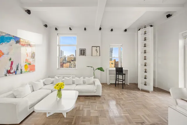 a living room with furniture and a couch