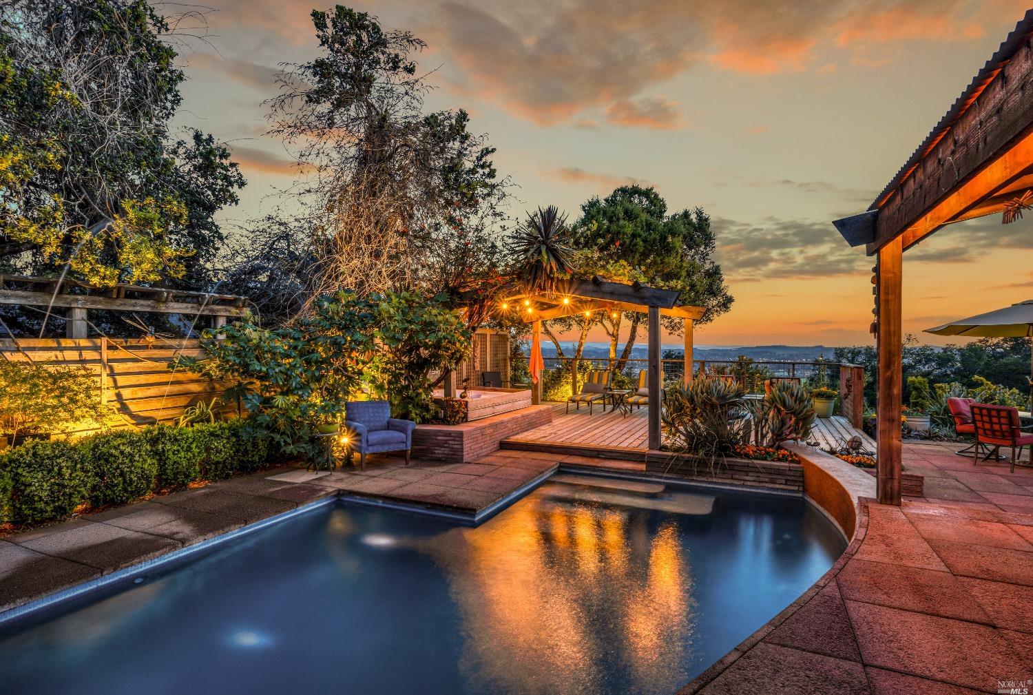 5507 Inverness Avenue Santa Rosa, CA 95404 - Photo 1 of 1 a view of a swimming pool with couches and city view