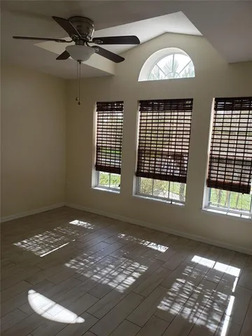 a view of an empty room and window