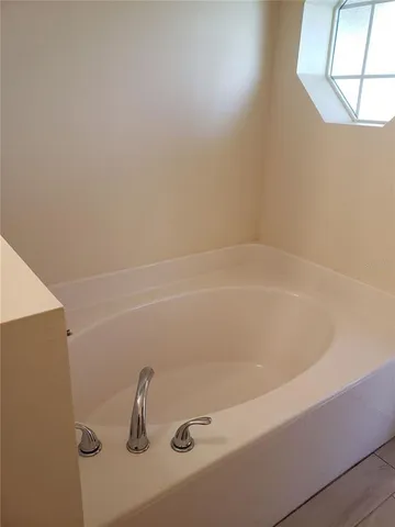 a close up of a bathtub