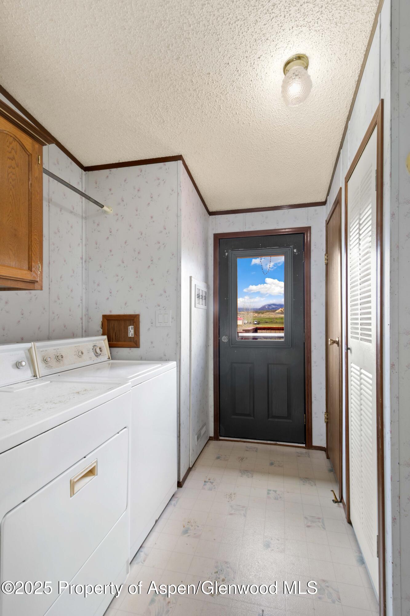 233 County Road 265 Rifle, CO 81650 - Photo 24 of 35 a view of a bathroom with a sink and mirror