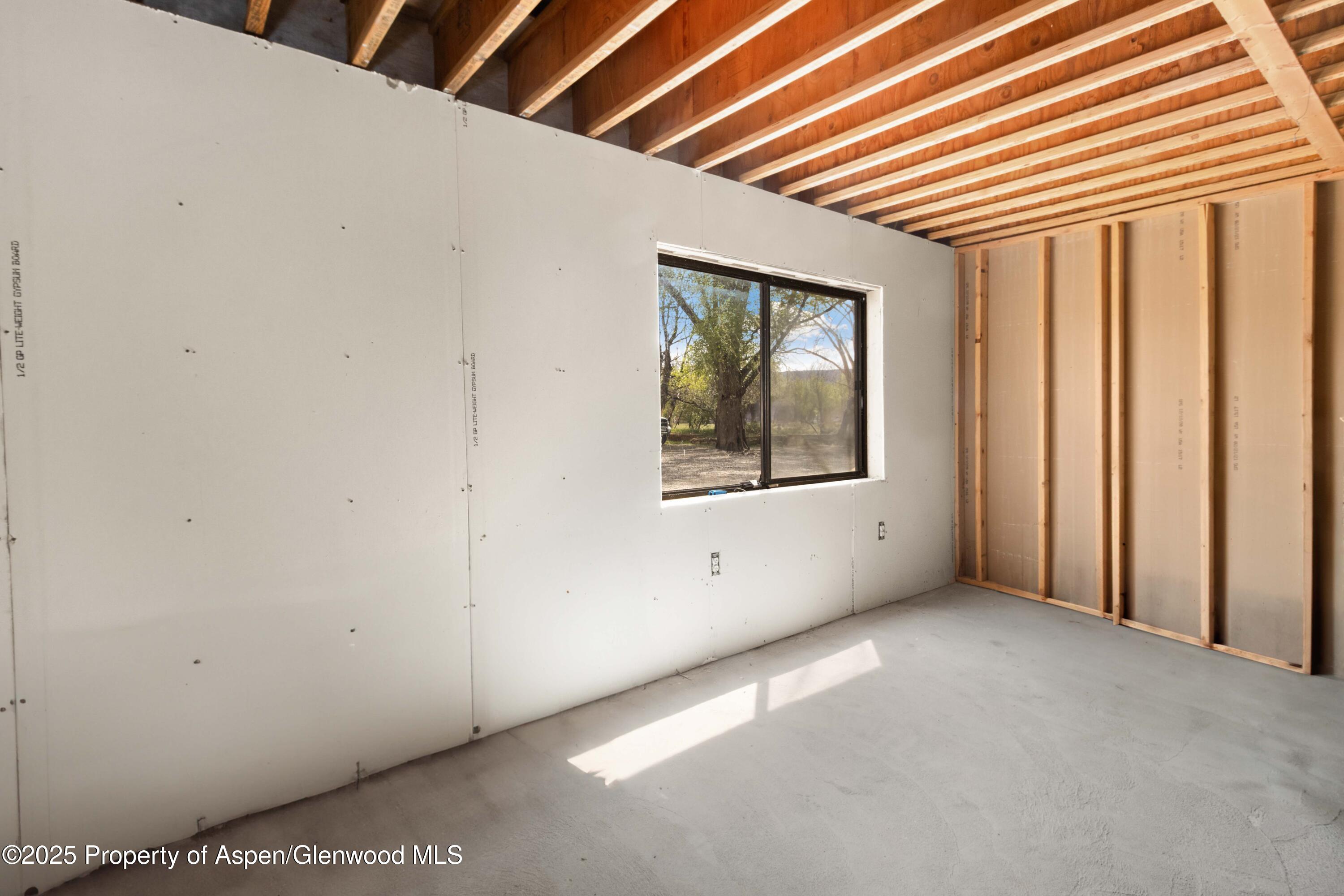 233 County Road 265 Rifle, CO 81650 - Photo 33 of 35 a view of an empty room with a window