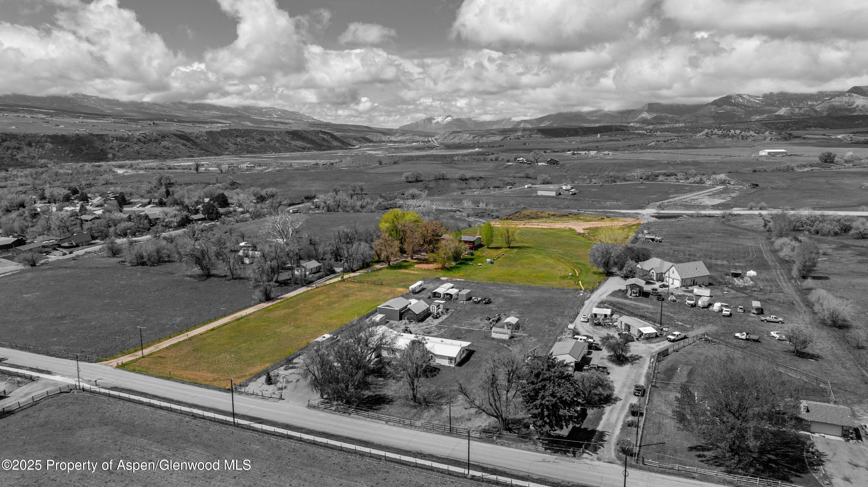 233 County Road 265 Rifle, CO 81650 - Photo 10 of 35 a view of a yard with an outdoor seating