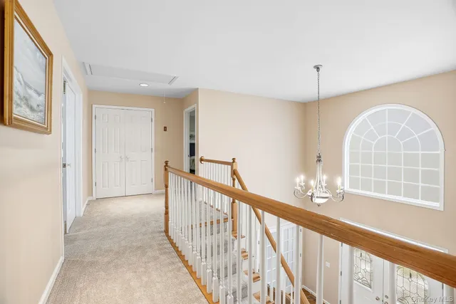 a view of a livingroom with wooden floor