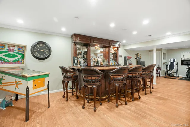 a view of a dining area with furniture and a large window