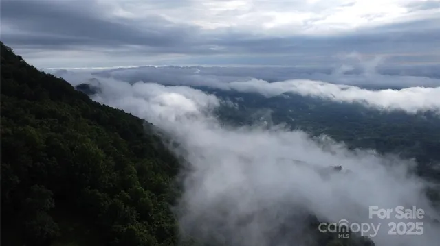 a picture of a bathroom with a sink and wooden floor