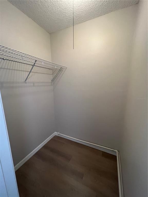 2611 Pine Lake Terrace, Unit B Sarasota, FL 34237 - Photo 14 of 21 a view of a room with racks on the wall