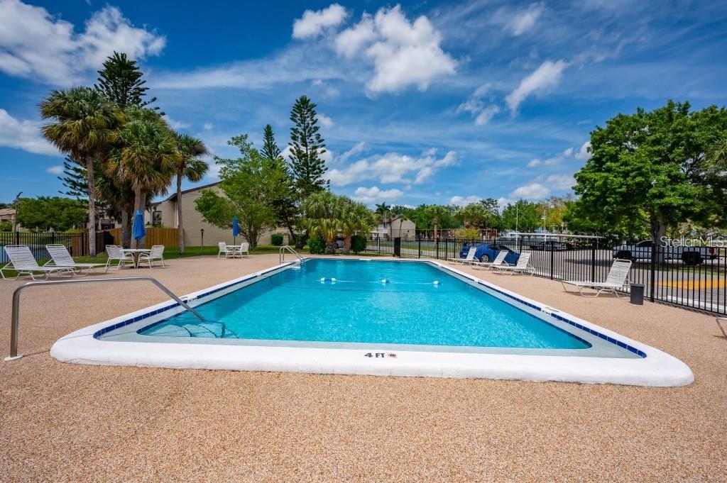 2611 Pine Lake Terrace, Unit B Sarasota, FL 34237 - Photo 16 of 21 a view of outdoor space and swimming pool