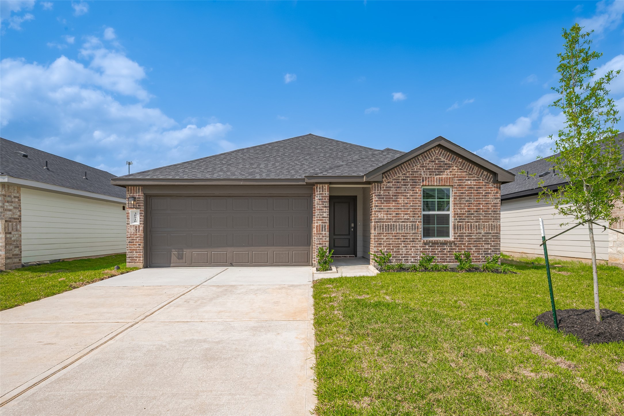 30910 Rockstock Road Fulshear, TX 77441 - Photo 32 of 33 This charming single-story brick beauty offers modern curb appeal, a spacious 2-car garage, and a cozy front porch