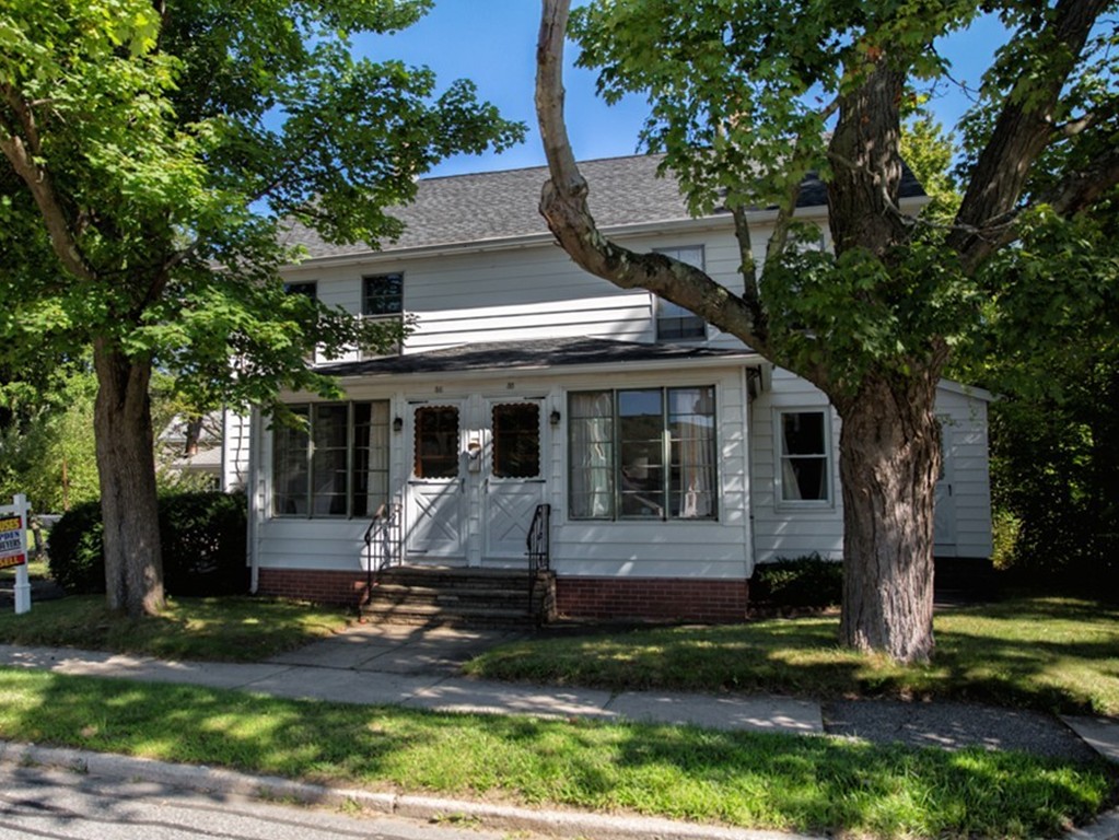 front view of house with a yard