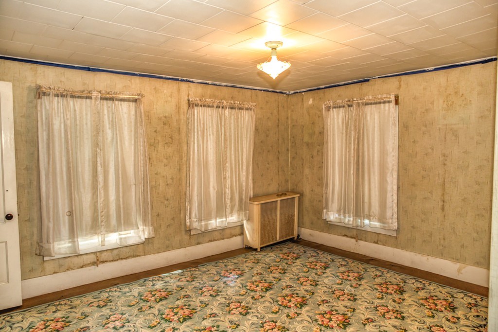 38 Bourne Street Three Rivers, MA 01080 - Photo 12 of 30 a view of a room with a window and a shower curtain