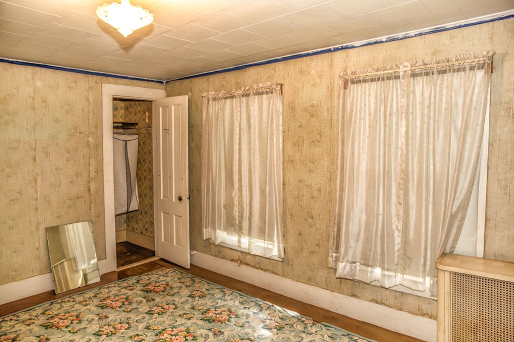 38 Bourne Street Three Rivers, MA 01080 - Photo 13 of 30 a view of a window with a curtain and wooden floor