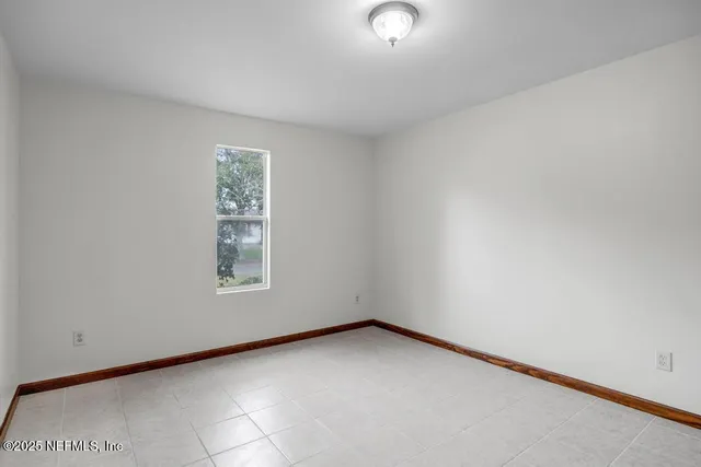 an empty room with a window