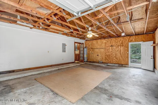 a view of a room with wooden walls