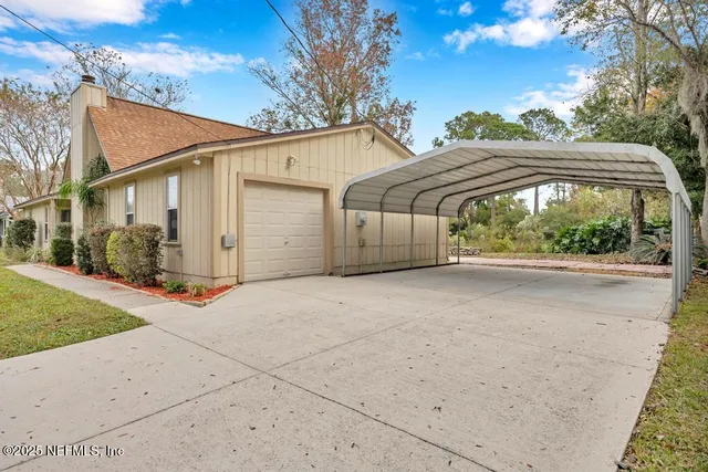 a view of a house with a street