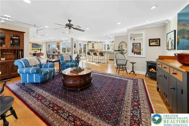 a living room with furniture and a rug
