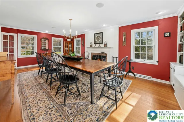 a view of a dining room with furniture window and outside view