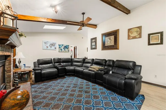 a living room with furniture and a rug