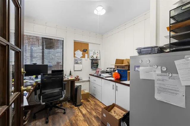 a room with furniture and a flat screen tv