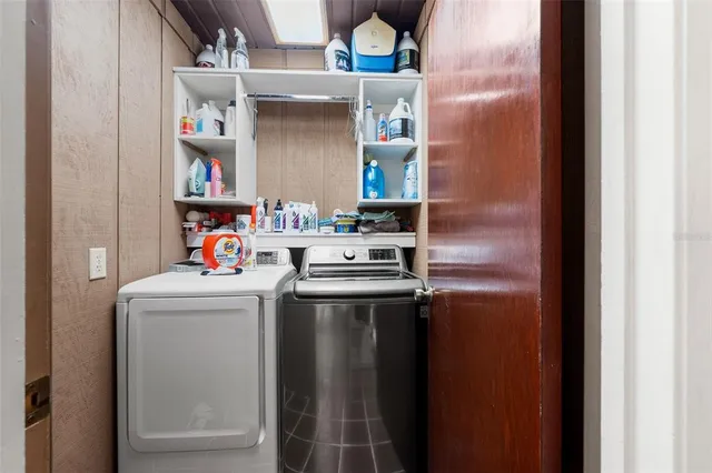 a utility room with dryer and washer
