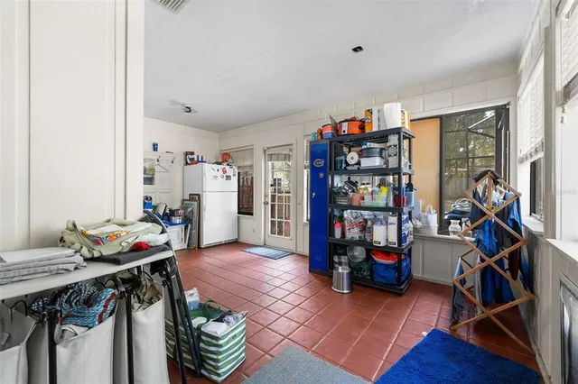 a view of a workspace with furniture and toys